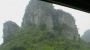 Karst limestone peaks, as seen from a train, Guangxi
