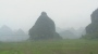 Karst limestone hill, as seen from a train, Guangxi